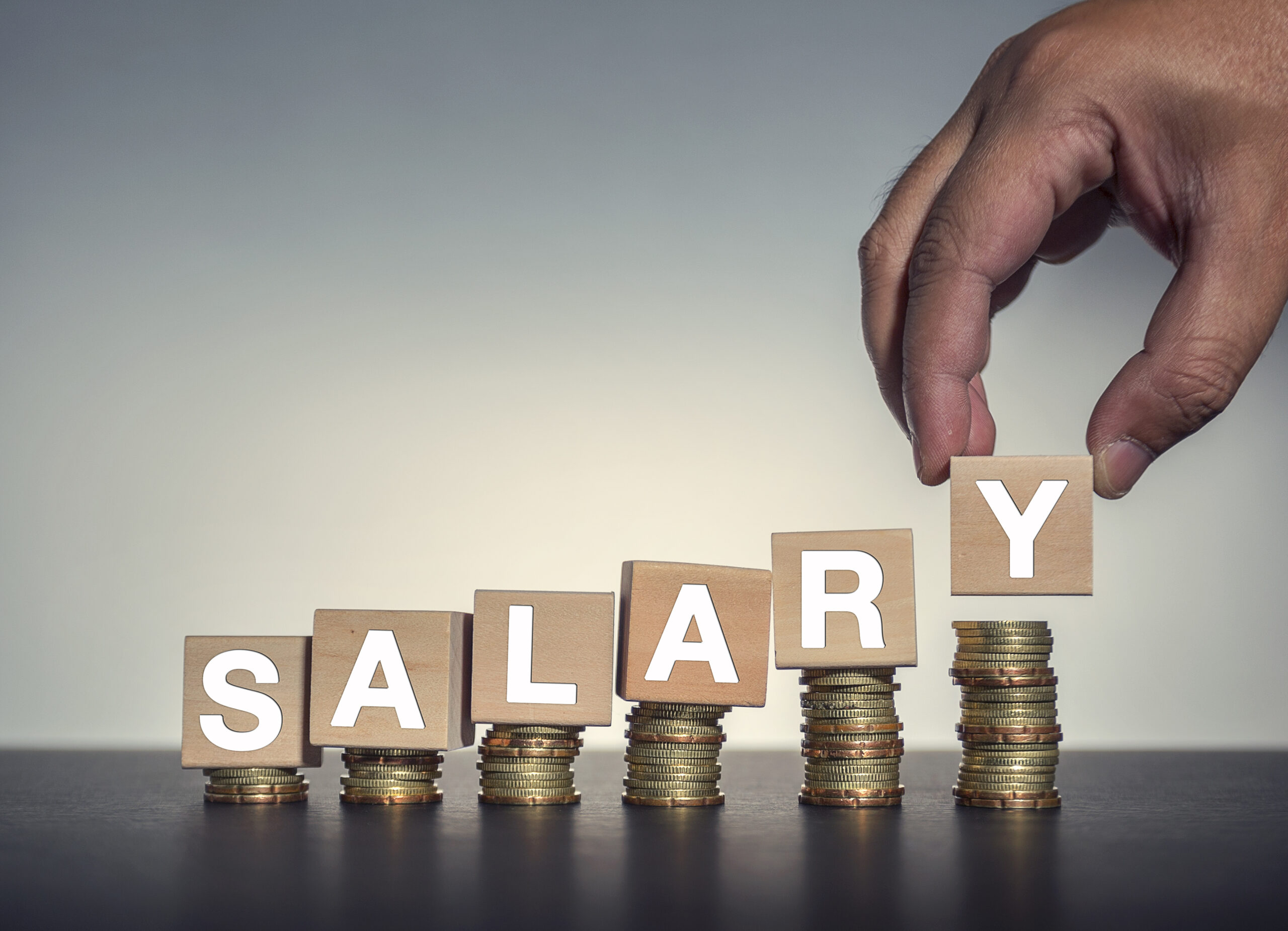 Coin,Stacks,With,Letter,Wooden,Blocks,-,Salary Quora Users Add Humor to Surviving in Bengaluru on ₹94.1 LPA Salary